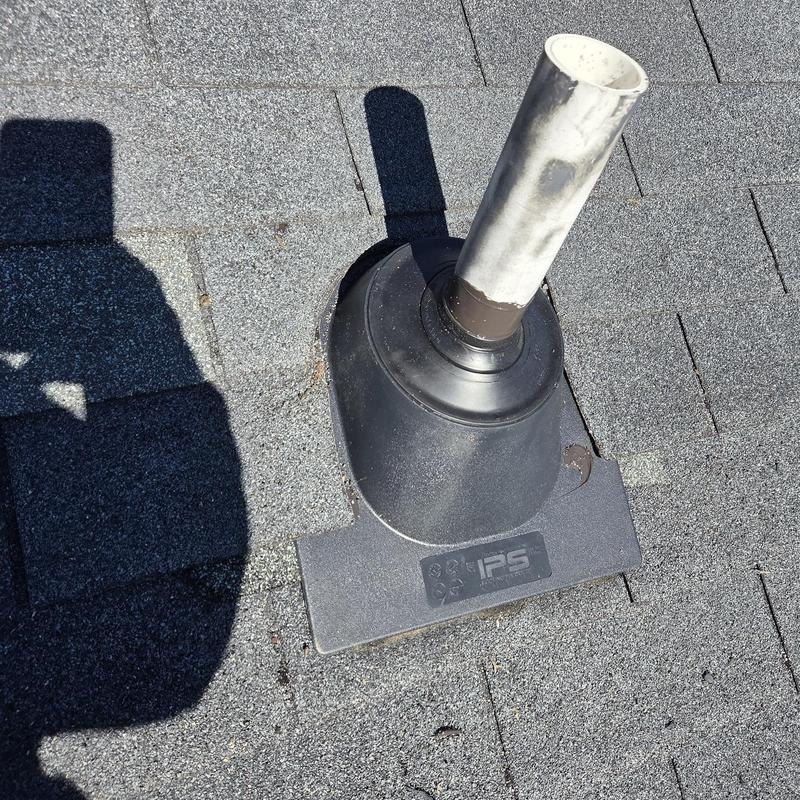 Pipe boot on asphalt shingle roof with replaced decking