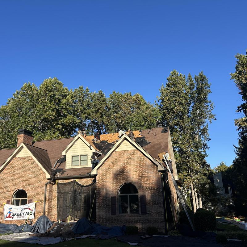 50-year shingle roof installation on brick home
