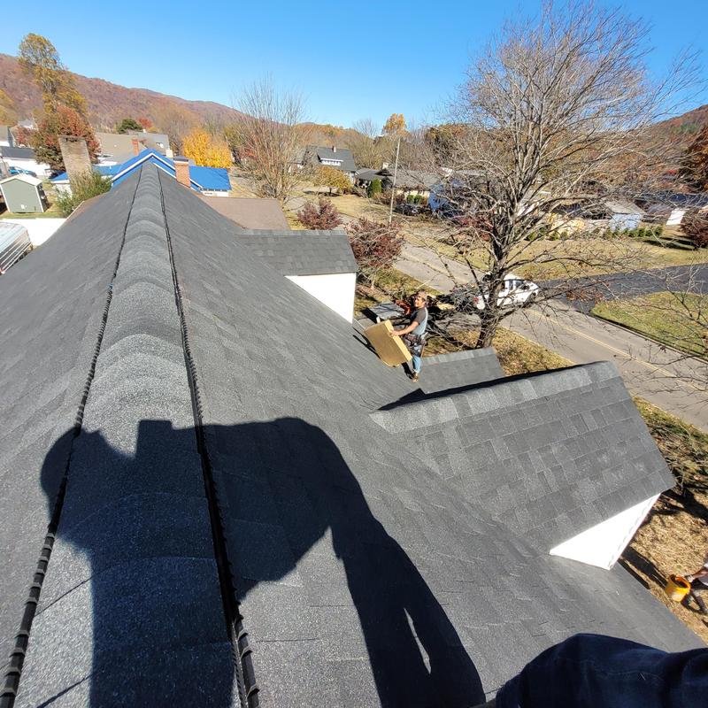 Roof shingles installation on residential house
