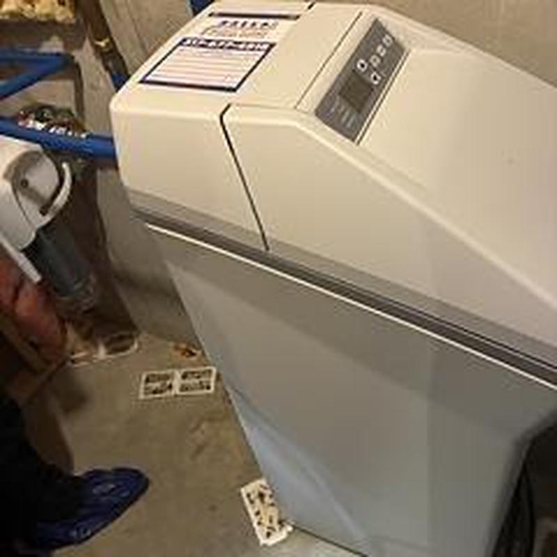 1.5 cube water softener unit with plumbing connections