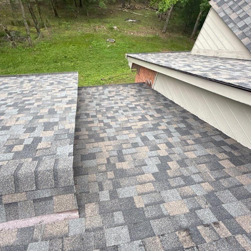 Asphalt shingle roof with hail damage inspection