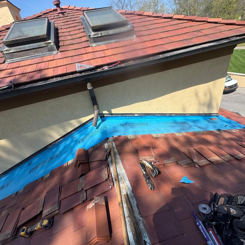 Roof valley and flashing with tile removal and inspection