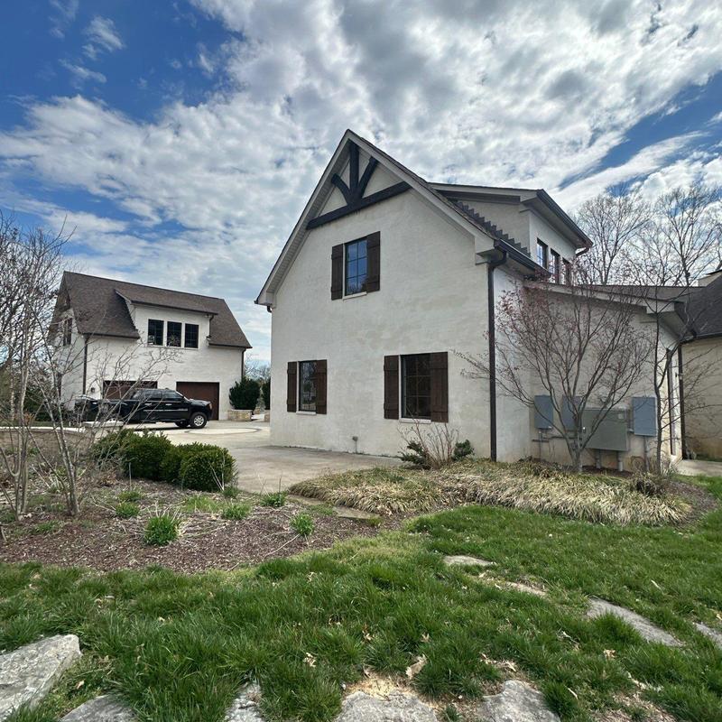 Roof ridge and flashing inspection on two-story home