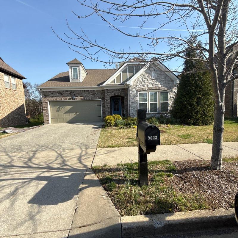 Asphalt shingle roof with hail damage inspection