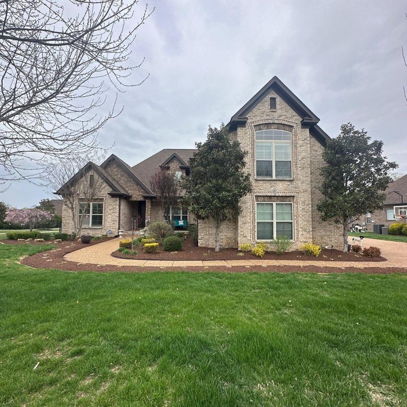 Roof shingles with hail damage on residential home