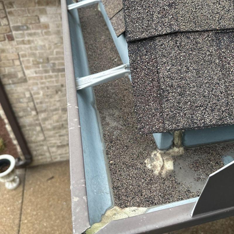 Roof ridge cap and gutter with flashing sealant