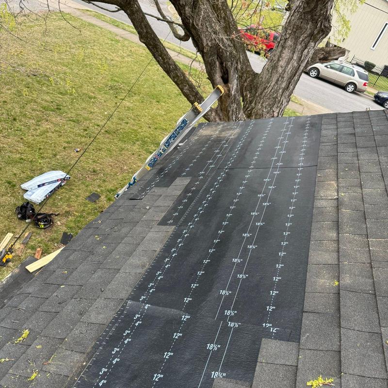 Asphalt shingle roof underlayment installation on slope