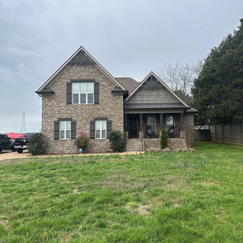 Shingle roof with hail damage on residential home