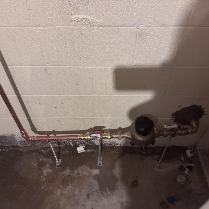 Water meter and copper piping installation near well