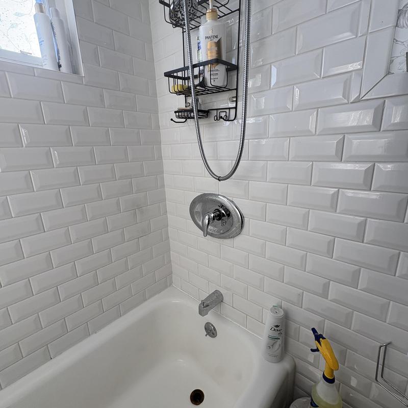 Moen Positemp valve with tub spout and showerhead