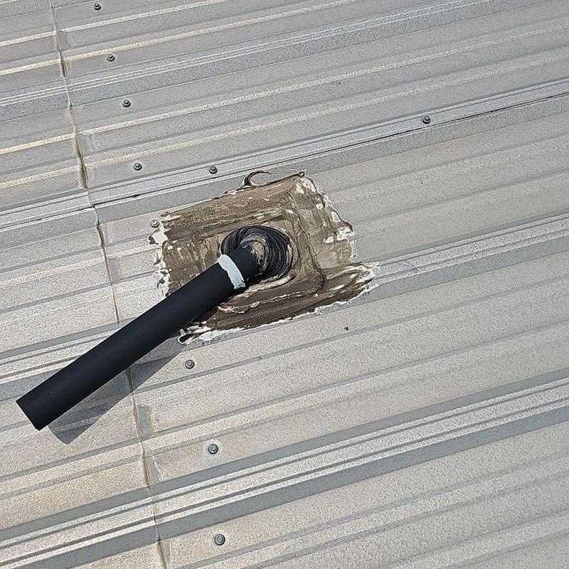 Metal roof pipe seal with silicone patch applied Metal roof pipe seal with silicone patch applied