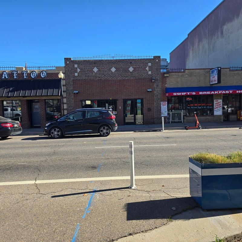 Modified bitumen flat roof with resealed seams and cap metal Modified bitumen flat roof with resealed seams and cap metal