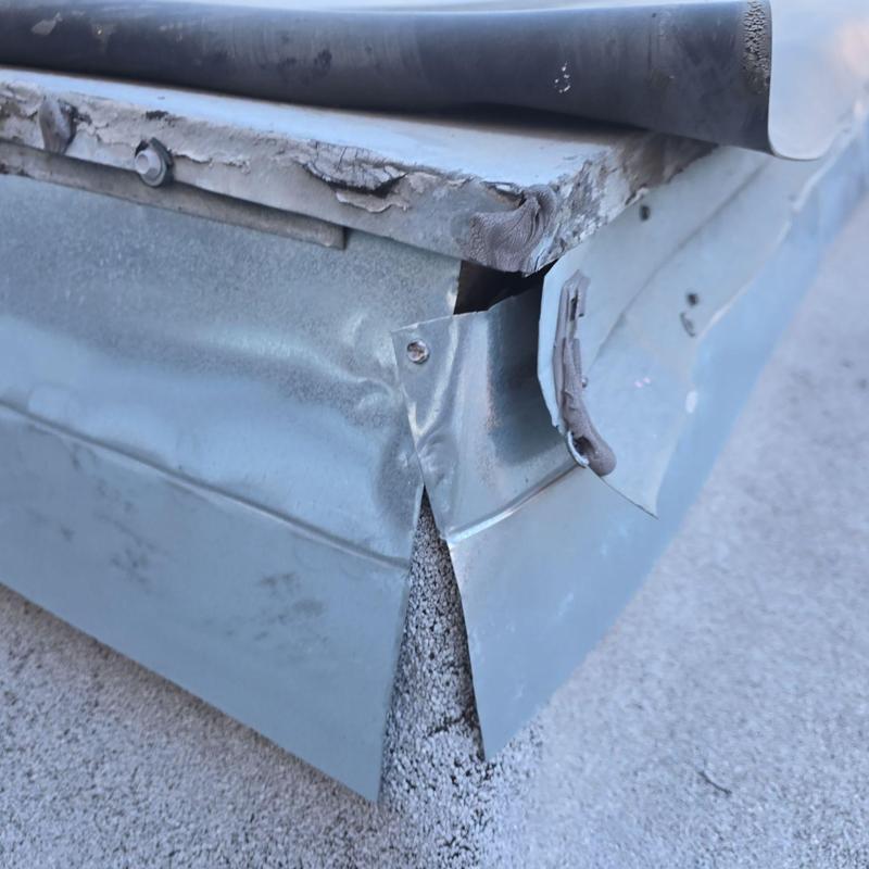 TPO flat roof edge damage and metal flashing corrosion TPO flat roof edge damage and metal flashing corrosion