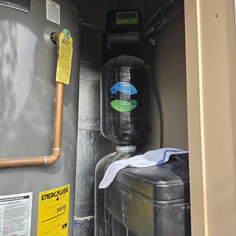 Water softener system with control valve and tank