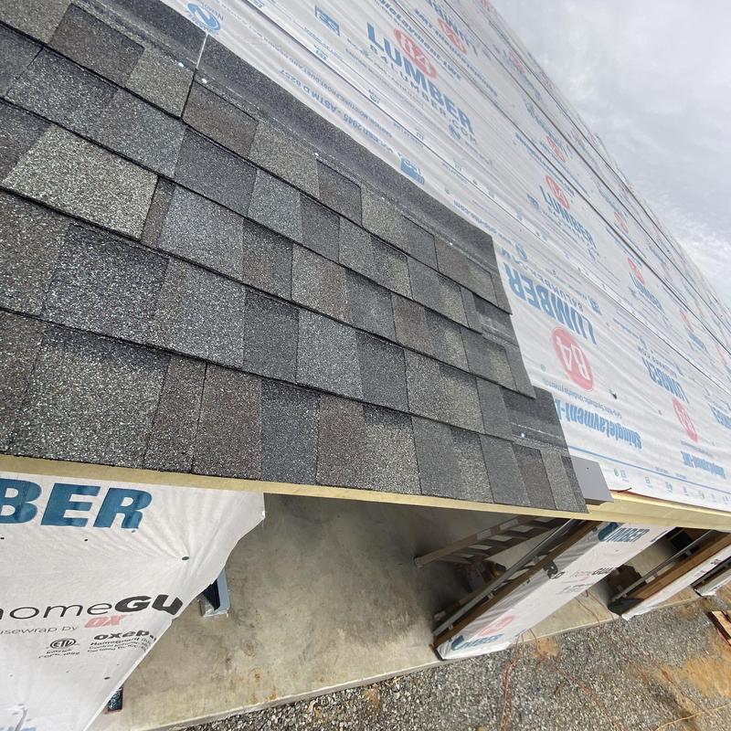 Roof shingles sample installation on new construction home