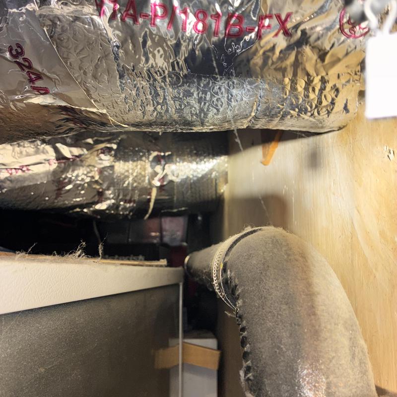 Kitchen sink drain pipe with clear tubing clamp