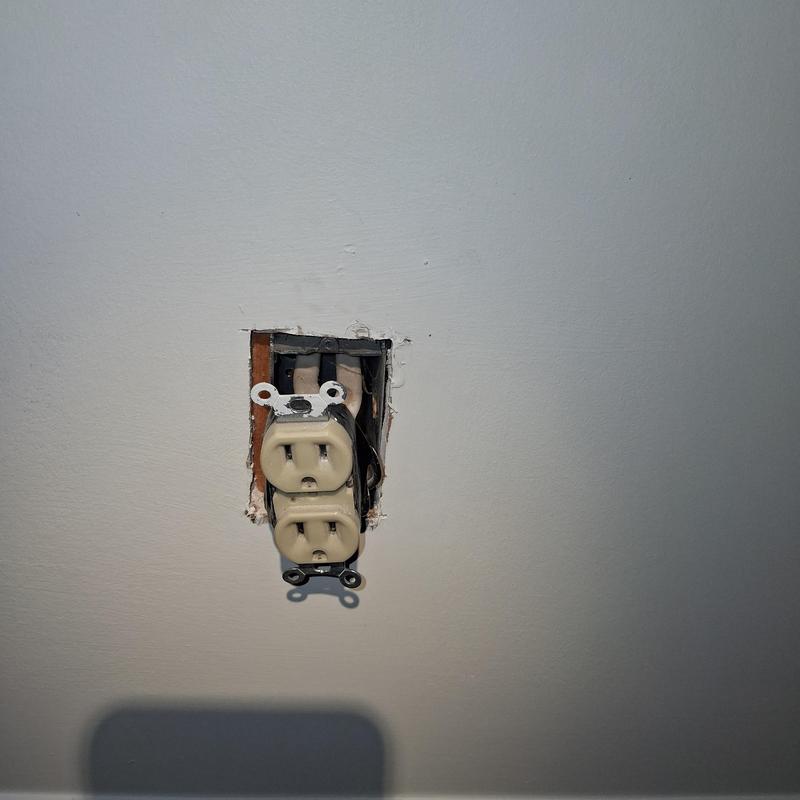 Receptacle outlet installation with exposed wiring Receptacle outlet installation with exposed wiring