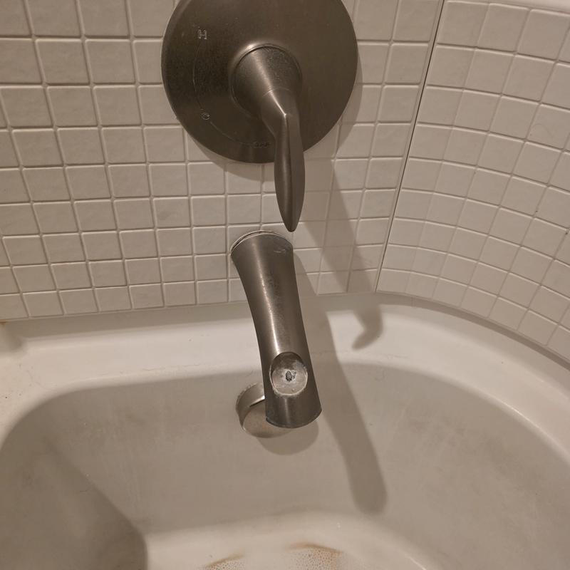 Diverter tub spout missing handle in tiled bathtub