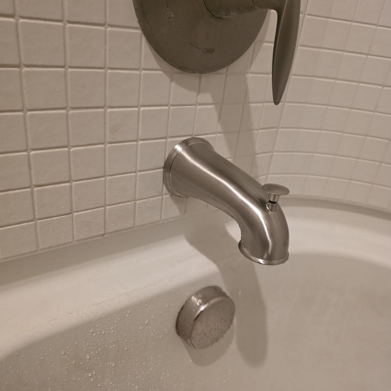 Diverter tub spout with handle and tiled wall