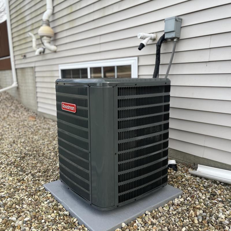 Goodman high efficiency air conditioner unit outdoors Goodman high efficiency air conditioner unit outdoors