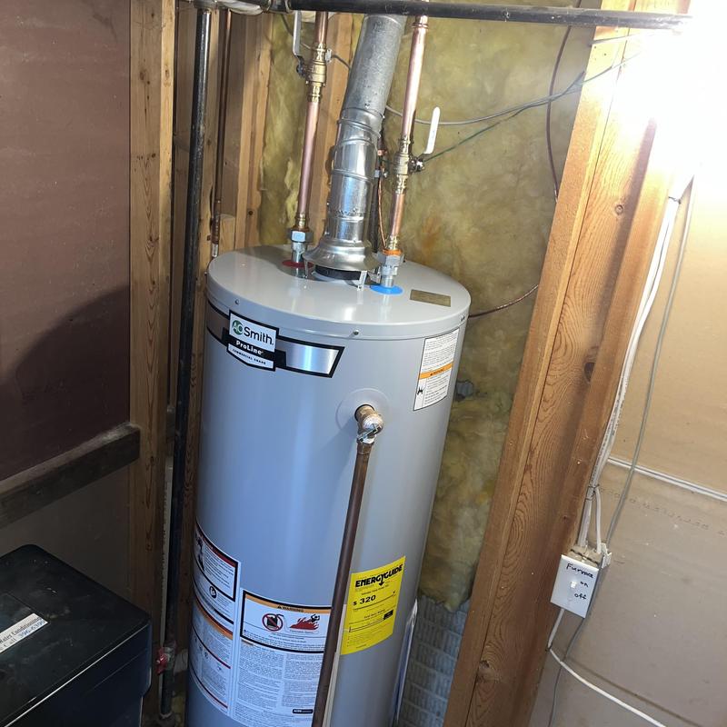 A.O. Smith water heater installation in basement wall space A.O. Smith water heater installation in basement wall space