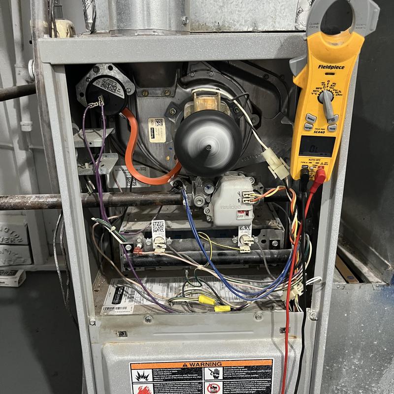 Lennox inducer motor and clamp meter in furnace panel Lennox inducer motor and clamp meter in furnace panel