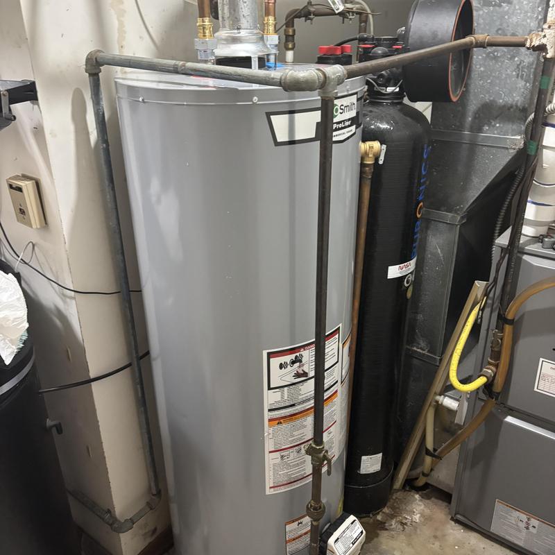 A.O. Smith water heater with piping installed in utility room A.O. Smith water heater with piping installed in utility room