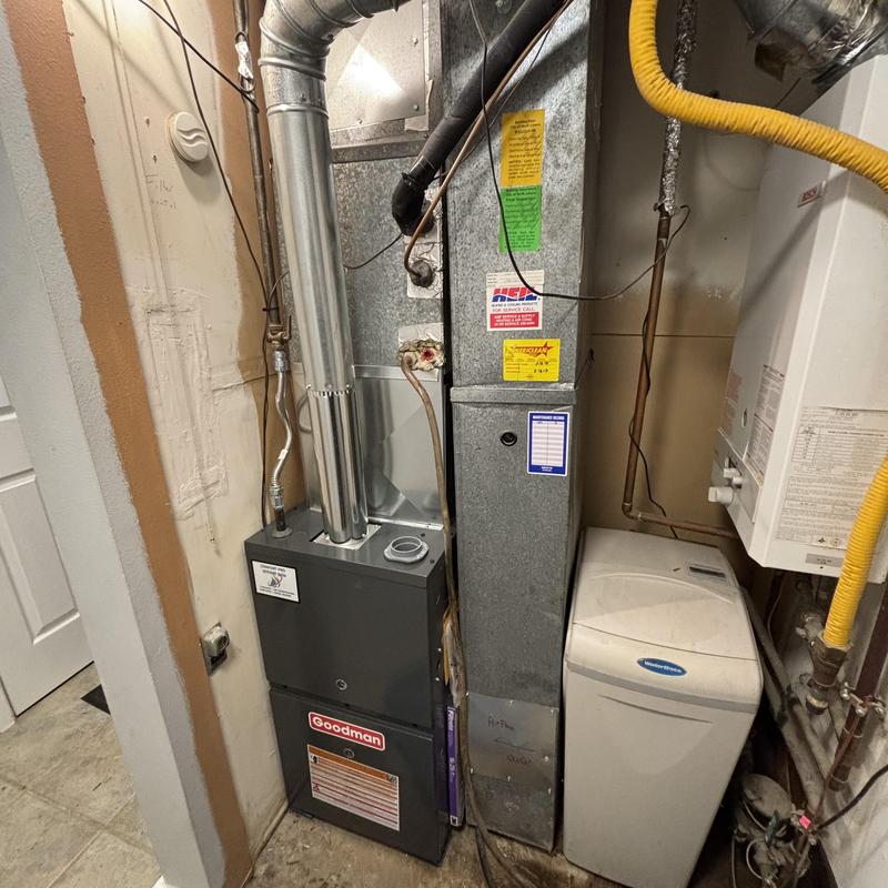 Goodman furnace with vent and water softener unit Goodman furnace with vent and water softener unit