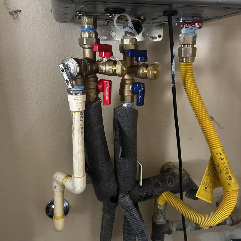 Tankless water heater hot and cold service valves