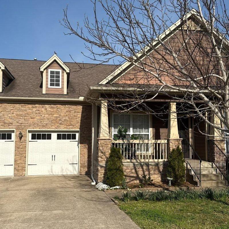 Asphalt shingle roof with hail damage inspection