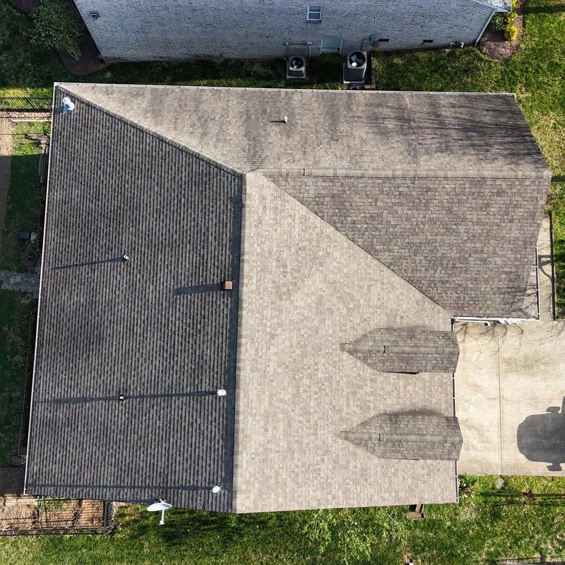 Asphalt shingle roof with hail damage inspection