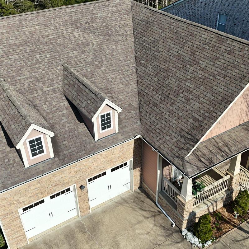 Asphalt shingle roof with hail damage inspection