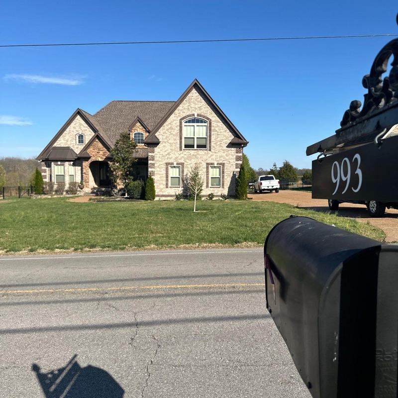 Asphalt shingle roof with hail damage inspection