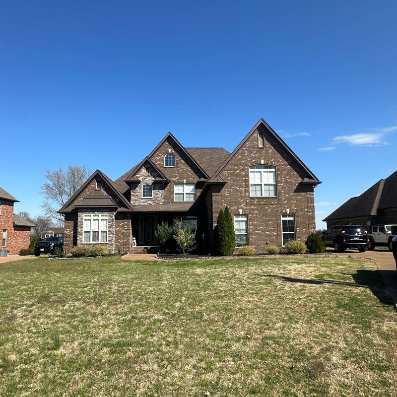 Roof shingles with hail damage inspection on residential home