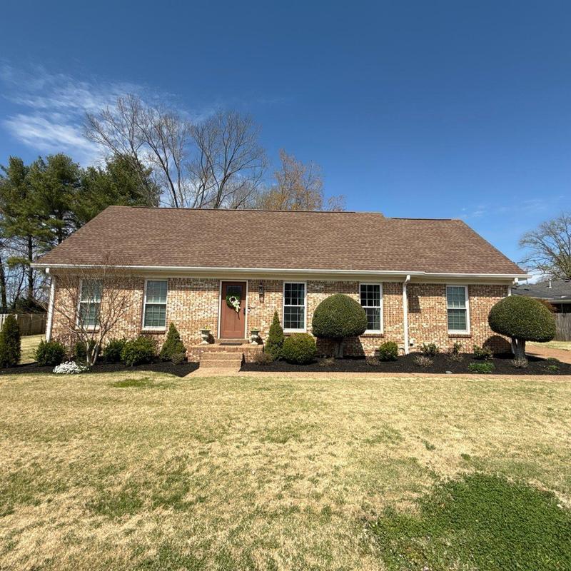 Asphalt shingle roof with visible hail damage