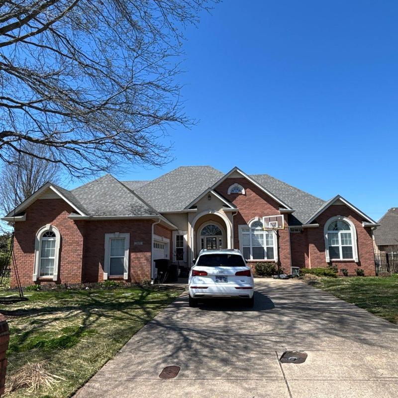 Asphalt shingle roof inspection with hail damage noted