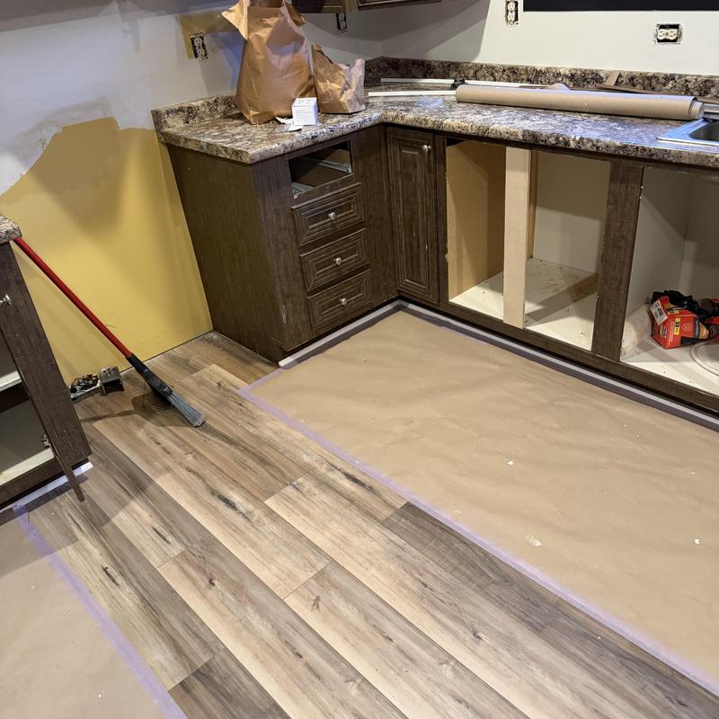 Kitchen cabinet doors and drawer installation in progress
