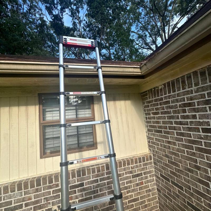 Roof gutter and edge with ladder setup for inspection