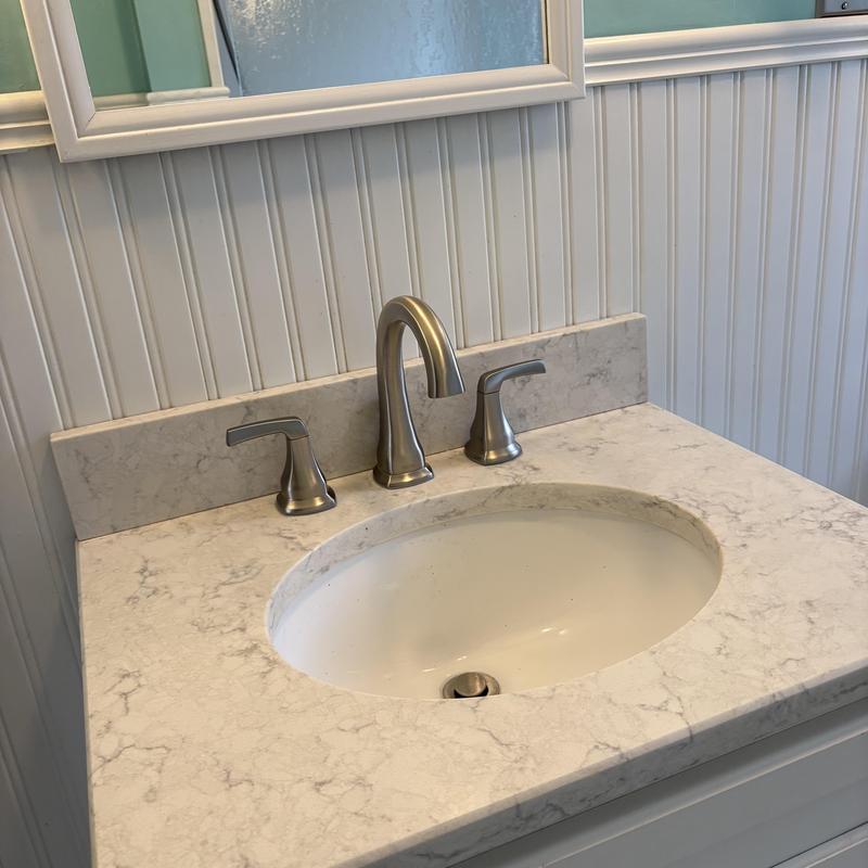 Delta faucet installation on marble bathroom vanity