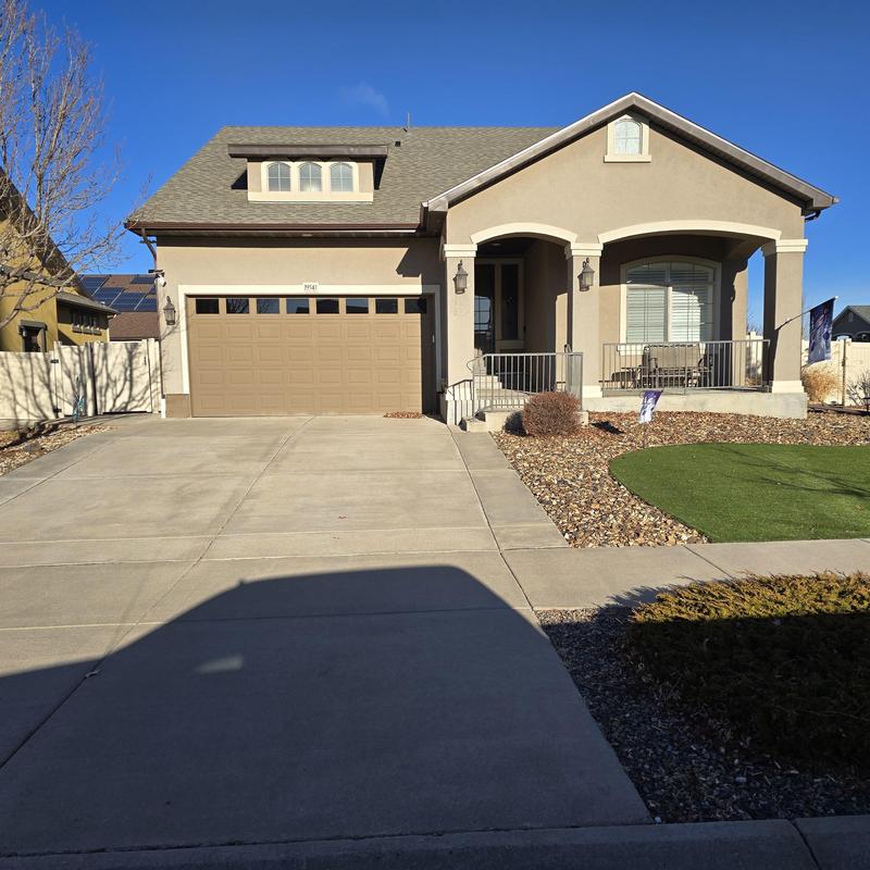Vinyl siding J-channel reattached on beige house exterior Vinyl siding J-channel reattached on beige house exterior