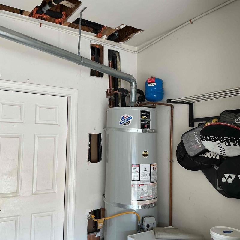 Water heater and piping installation in utility room