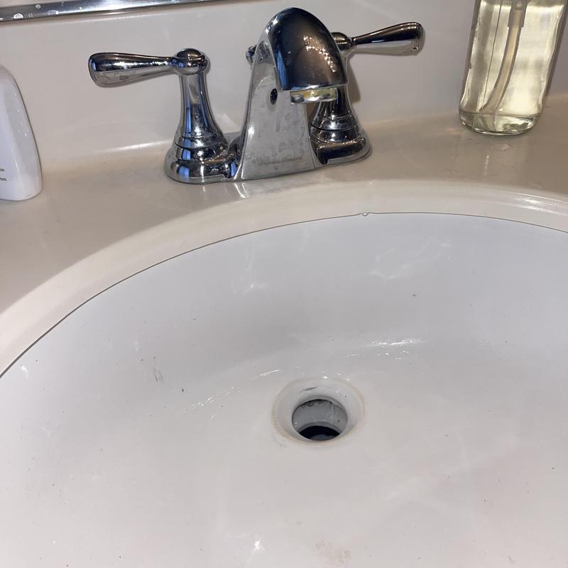 Pop-up drain removal and seal installation in bathroom sink