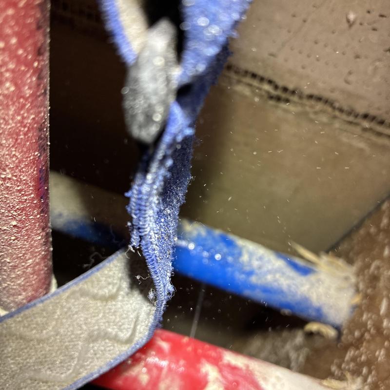 Hot water supply pipe behind shower valve with repair straps