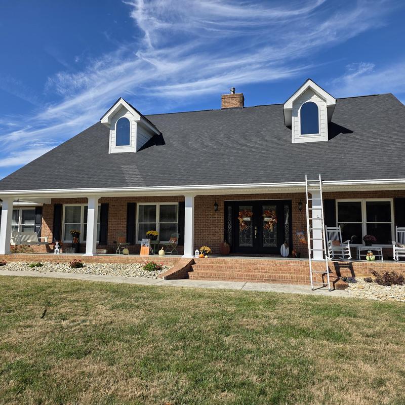 Roof with new shingles, gutters, and window replacement