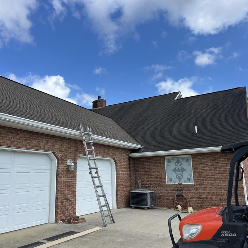 Asphalt shingle roof with gutters and window replacement
