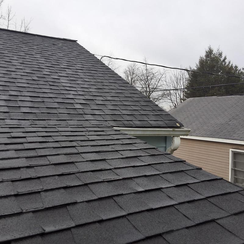 ATLAS Pinnacle Pristine Pewter shingles on chimney roof