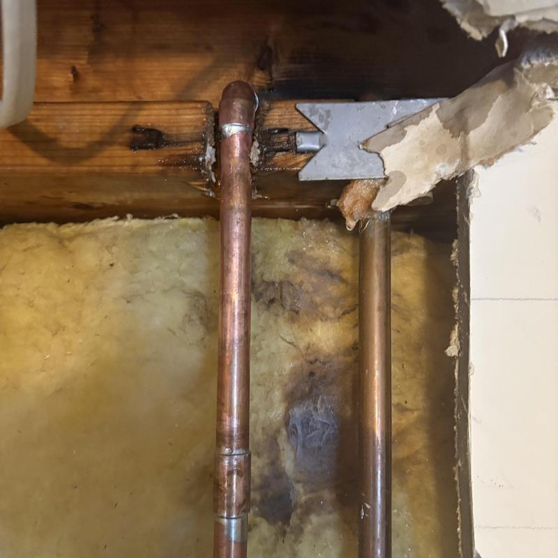 Copper half-inch waterline with ceiling wall opened