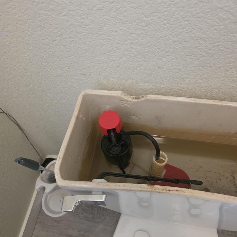 Toilet fill valve and flapper chain adjustment inside tank