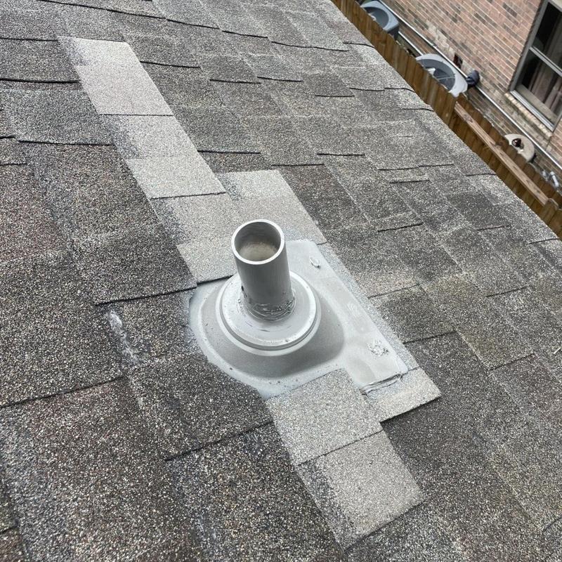 Pipe boot flashing on asphalt shingle roof repair