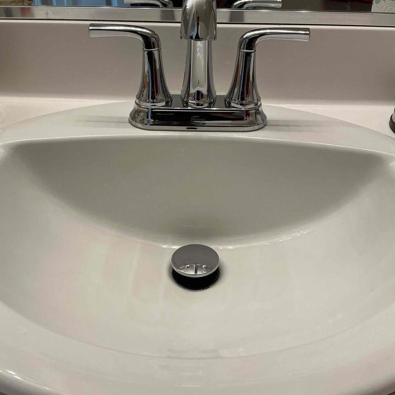 Pfister four-inch center set lavatory faucet and pop-up drain